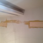soigneur_building_wall_painting_under_wall